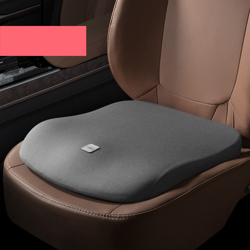 Grey seat cushion on a car seat