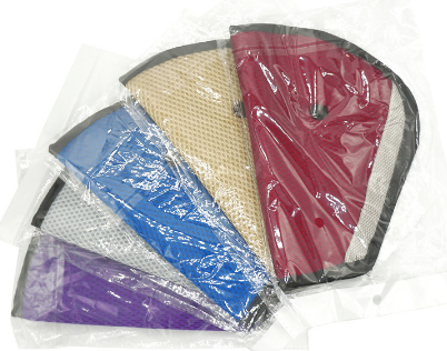 Seat belt adjuster pads