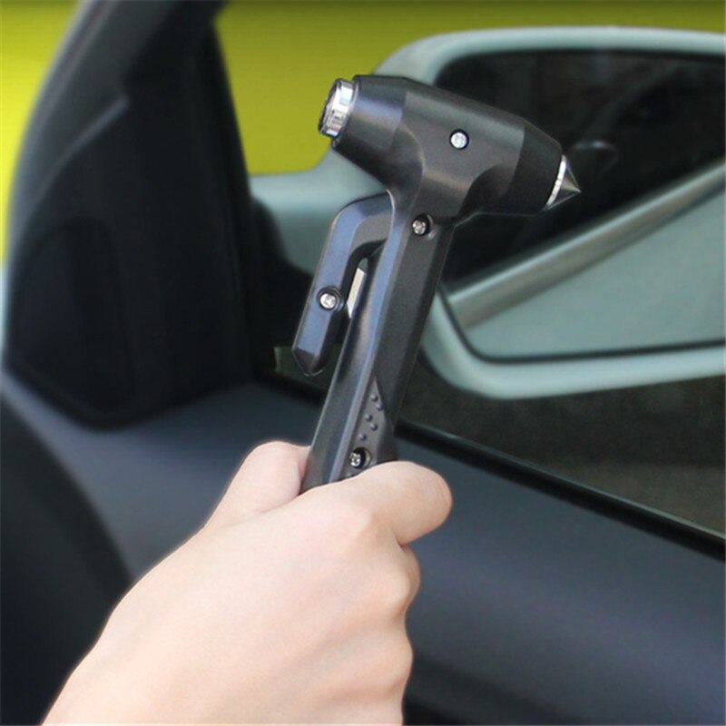 Using the safety hammer to break a side window