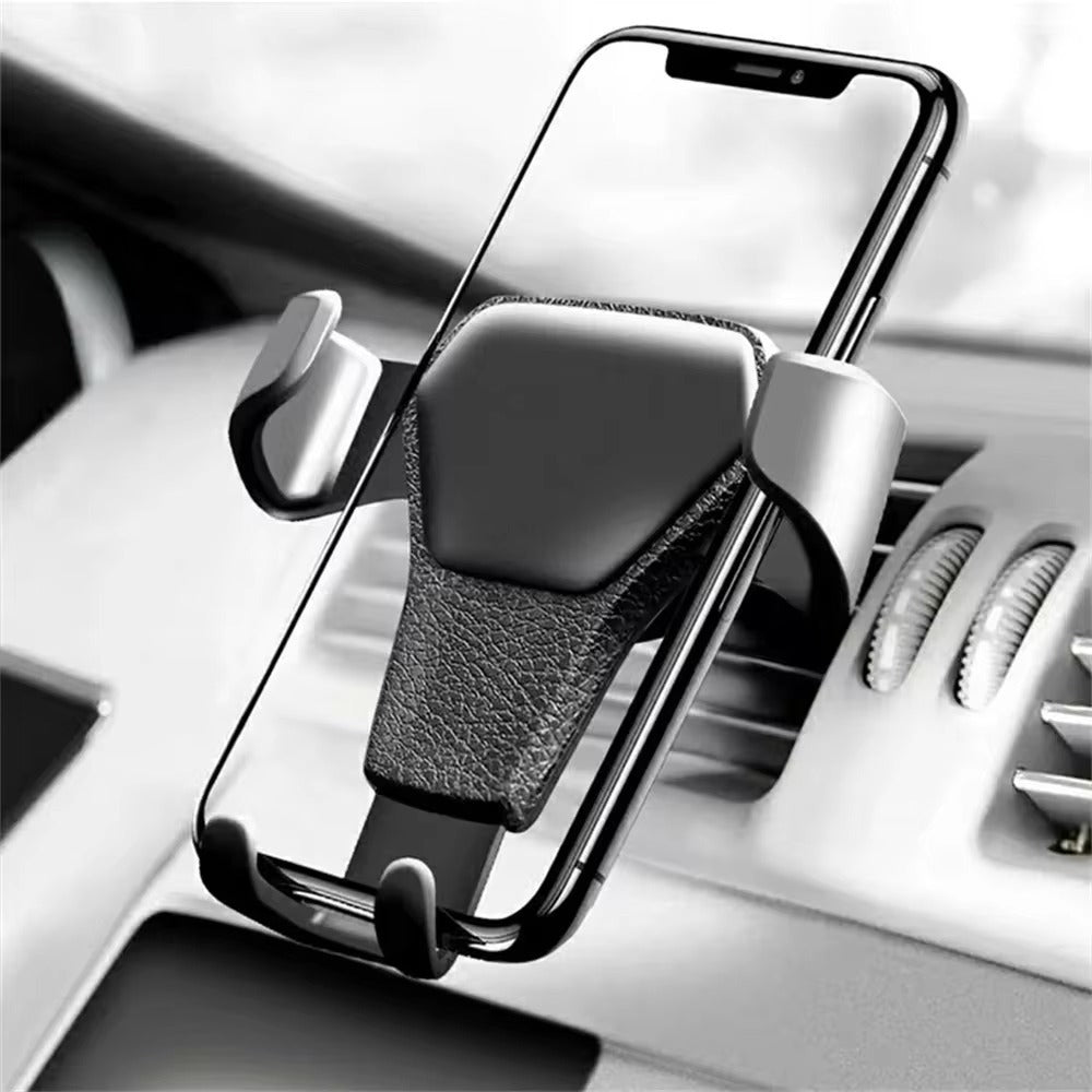 Gravity phone holder on a car air vent