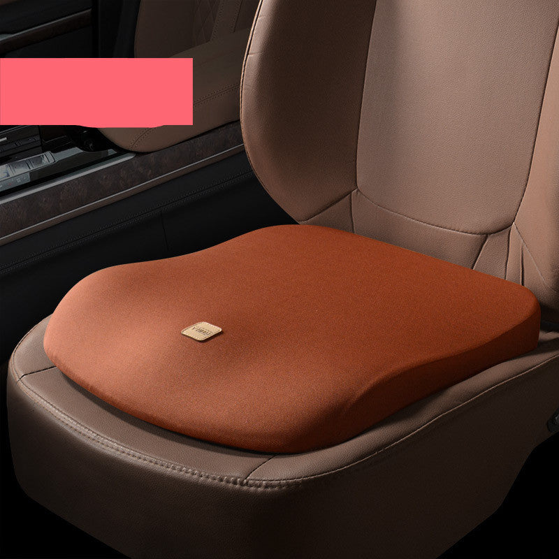 Brown seat cushion on a car seat