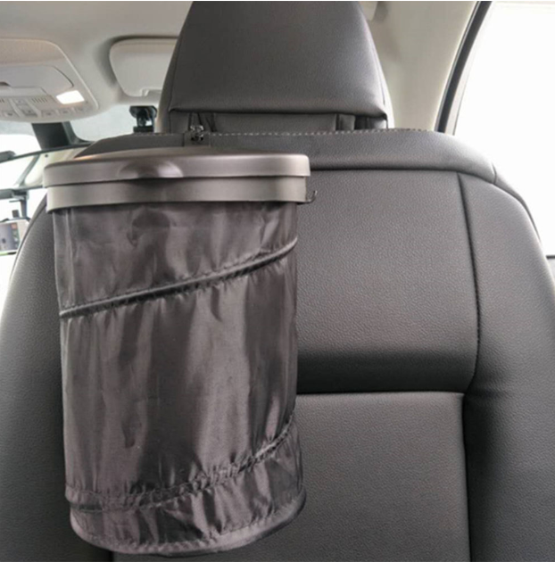 Car trash bin hanging on a seat back