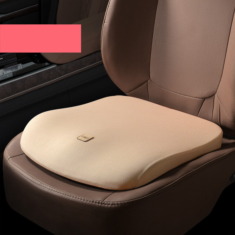 Apricot seat cushion on a car seat